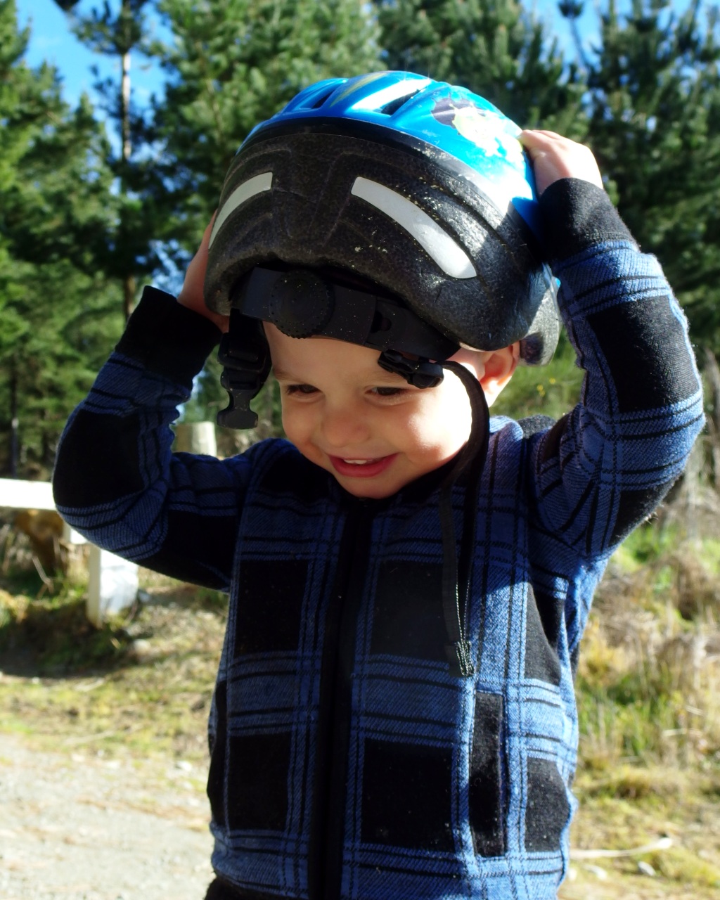 140718 Finn gets to grips with helmet